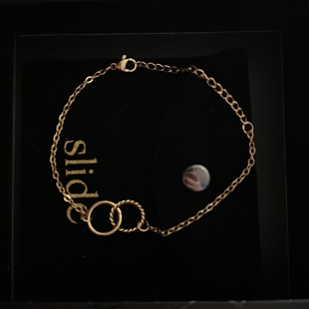 Slide gold tone bracelet